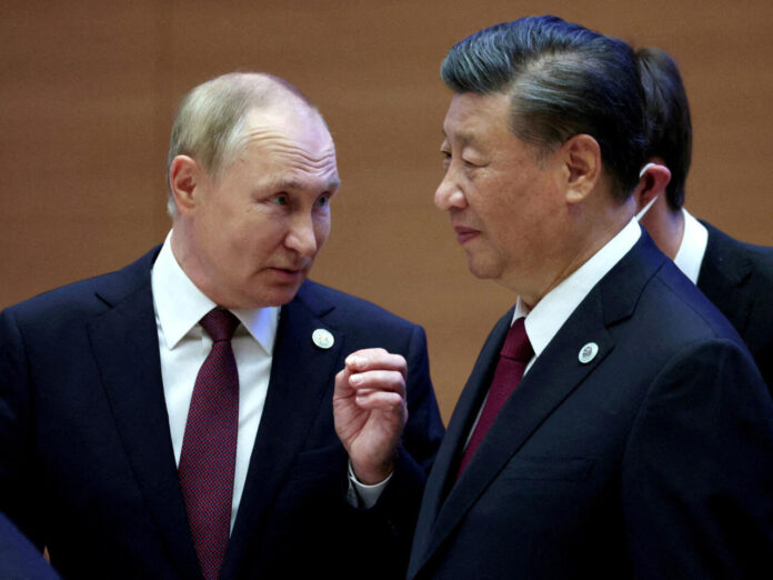 2023-03-17T081013Z_136807759_RC27IW9F4YA6_RTRMADP_3_CHINA-DIPLOMACY-XI-KREMLIN